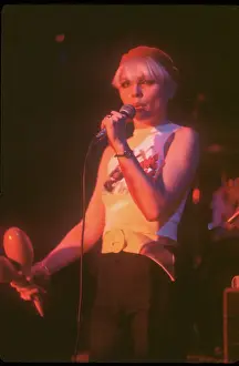 Prints of CIRCA 1979: Singer Debbie Harry of the New Wave pop group Blondie performs onstage wearing a King Kong t-shirt in circa 1979. (Photo by Michael Ochs Archives/Getty Images) A Rare Collection of Striking Prints Capturing the Essence of Blondie: Blondie Performing In LA