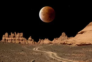 Images Dated 28th September 2015: Blood moon over Libyan desert