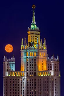 Images Dated 23rd August 2014: blood moon with one of seven sisters, moscow russia