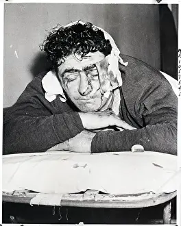 Attacking Prints: Bloody Policeman Lies On Gurney