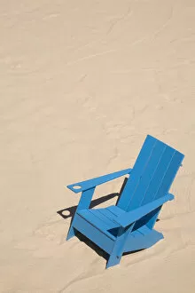 Blue adirondack chair standing on a beach, Old Port of Montreal, Quebec Province, Canada