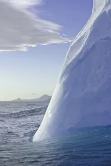 Images Dated 24th October 2007: Blue iceberg floating in sea in spring