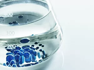 Blue liquid inside glass beaker