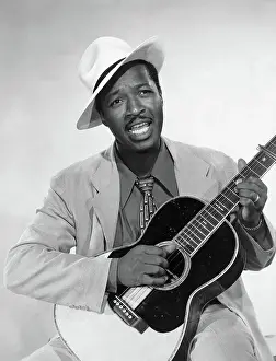 Blues Singer Josh White Strumming Guitar