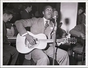 Blues Singer Josh White Strumming Guitar