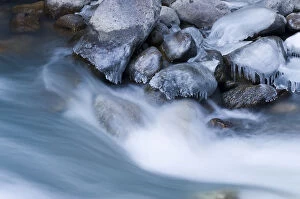 Blurred view of rocky frozen river
