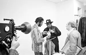 Prints of NEW YORK - MAY 6: Guitarists Bo Diddley and Chuck Berry (on the left) relax backstage at Madison Square Garden in the concert movie ´Let the Good Times Roll´ on May 6, 1972 in New York City Bo Diddley: Rhythm & Riffs Prints: Bo Diddley & Chuck Berry Let The Good Times Roll