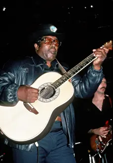 Prints of NEW YORK - CIRCA 1983: Bo Diddley in concert circa 1983 in New York. (Photo by Robin Platzer/Images/Getty Images) Bo Diddley: Rhythm & Riffs Prints: Bo Diddley in concert