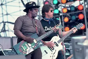 Prints of Bo Diddley, left, and George Thorogood perform at Live Aid at Veteran's Stadium in Philadelphia, Pennsylvania, July 13, 1985. (Photo by Paul Natkin/Getty Images) Bo Diddley: Rhythm & Riffs Prints: Bo Diddley And George Thorogood