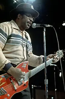 Prints of CIRCA 1976: Guitarist Bo Diddley plays his Gretsch electric guitar as he performs on a TV show in circa 1976. (Photo by Michael Ochs Archives/Getty Images) Bo Diddley: Rhythm & Riffs Prints: Bo Diddley Performs On A TV Show