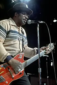 Prints of CIRCA 1976: Guitarist Bo Diddley plays his Gretsch electric guitar as he performs on a TV show in circa 1976. (Photo by Michael Ochs Archives/Getty Images) Bo Diddley: Rhythm & Riffs Prints: Bo Diddley Performs On A TV Show