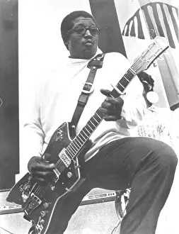 Bo Diddley Plays His Guitar
