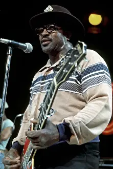 Prints of CIRCA 1976: Guitarist Bo Diddley plays his Gretsch electric guitar as he performs on a TV show in circa 1976. (Photo by Michael Ochs Archives/Getty Images) Bo Diddley: Rhythm & Riffs Prints: Bo Diddley On A TV Show