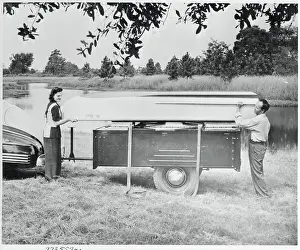 Boat atop Camp Trailer