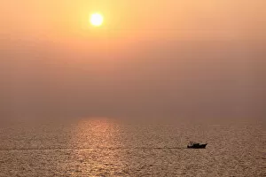Images Dated 24th January 2010: Boat on the sea, sunset, Kovalam, Kerala, southern India, India, Asia