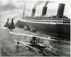 Boats & Airplane Greet Ocean Liner
