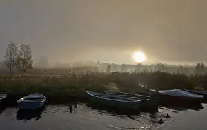 Lake Staffelsee Prints: Boats in the fog on Lake Staffelsee with the island of Woerth near Seehausen