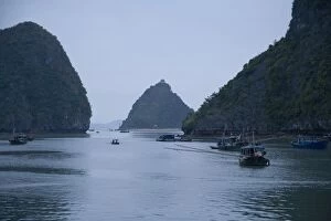 Images Dated 7th November 2005: Boats and islands at dusk on Vietnamese bay