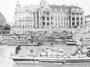 Lodgings Prints: Boats Passing by Hotel
