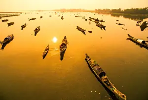 Center Prints: Boats in Tam Giang lagoon in sunrise from drone. Hue, Vietnam