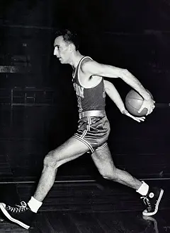 Bob Cousy Making a Skilled Move on Court