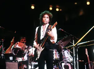 Prints of ATLANTA - DECEMBER 12: Bob Dylan performing onstage playing his Fender Stratocaster electric guitar and wearing a vest on December 12, 1978 at the Omni in Atlanta, Georgia Blowin' in the Wind: Bob Dylan's Photographic Legacy: Bob Dylan In Atlanta