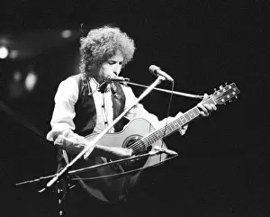 Prints of ATLANTA - DECEMBER 12: Bob Dylan performing onstage playing his Fender Stratocaster electric guitar and wearing a vest on December 12, 1978 at the Omni in Atlanta, Georgia Blowin' in the Wind: Bob Dylan's Photographic Legacy: Bob Dylan In Atlanta