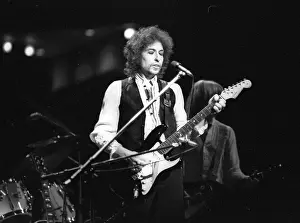 Prints of ATLANTA - DECEMBER 12: Bob Dylan performing onstage playing his Fender Stratocaster electric guitar and wearing a vest on December 12, 1978 at the Omni in Atlanta, Georgia Blowin' in the Wind: Bob Dylan's Photographic Legacy: Bob Dylan In Atlanta