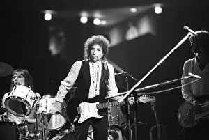 Prints of ATLANTA - DECEMBER 12: Bob Dylan performing onstage playing his Fender Stratocaster electric guitar and wearing a vest on December 12, 1978 at the Omni in Atlanta, Georgia Blowin' in the Wind: Bob Dylan's Photographic Legacy: Bob Dylan In Atlanta