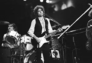 Prints of ATLANTA - DECEMBER 12: Bob Dylan performing onstage playing his Fender Stratocaster electric guitar and wearing a vest on December 12, 1978 at the Omni in Atlanta, Georgia Blowin' in the Wind: Bob Dylan's Photographic Legacy: Bob Dylan In Atlanta