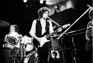 Prints of ATLANTA - DECEMBER 12: Bob Dylan performing onstage playing his Fender Stratocaster electric guitar and wearing a vest on December 12, 1978 at the Omni in Atlanta, Georgia Blowin' in the Wind: Bob Dylan's Photographic Legacy: Bob Dylan In Atlanta