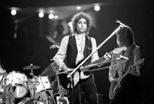Prints of ATLANTA - DECEMBER 12: Bob Dylan performing onstage playing his Fender Stratocaster electric guitar and wearing a vest on December 12, 1978 at the Omni in Atlanta, Georgia Blowin' in the Wind: Bob Dylan's Photographic Legacy: Bob Dylan In Atlanta