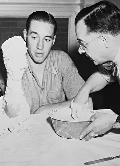 Bob Feller and Joseph Motto Using Plaster of Paris