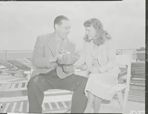 Bob Feller and Wife Softening Baseball Mitt Together