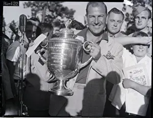 Check Prints: Bob Hamilton Holds Wanamaker Trophy