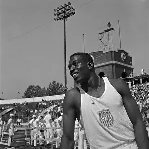 Bob Hayes Running Toward Finish Line Tape