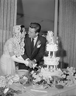 Bob Wagner and Natalie Wood Cutting Cake