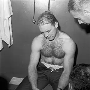 Bobby Hull Sitting Shirtless in Locker Room