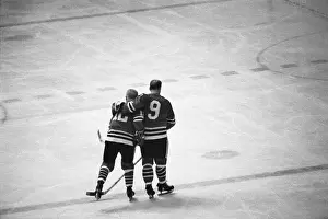 Bobby Hull Skating With Arm Around Teammate