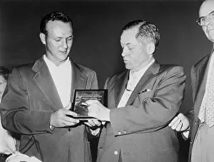 Prints of (Original Caption). Augusta, Georgia: Arnold Palmer, left, young pro from Latrobe, Pa Par for the Ages: Capturing the Triumphs and Tributes of Golf's Beloved 'King': Bobby Jones Presenting Masters Plaque to Arnold Palmer