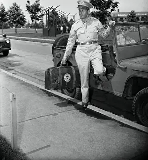 Bobby Jones Stepping Out of a Jeep