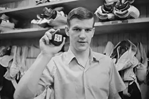 Bobby Orr Holding Record-Breaking Puck