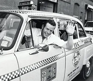 Taxi Prints: Bobby Unser Driving A Cab