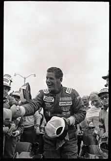 Bobby Unser Shaking Hands at the Winner Circle