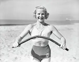 Pole Prints: Bodybuilder Relna Brewer Bending a Pole