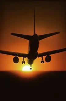 Airplane Prints: Boeing 757 landing in the sun at Los Angeles International Airport