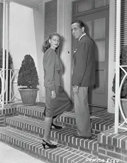 Prints of Actor Humphrey Bogart (1899-1957) and his wife, actress Lauren Bacall, pictured on the steps outside the front door of a house, USA, circa 1955. (Photo by Archive Photos/Getty Images) The Essence of Cool: Bogart And Bacall
