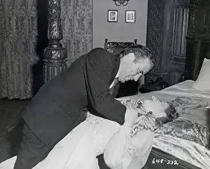 Prints of (Original Caption) 03/18/1949. TAKING THE BOGIE OUT OF BOGART (second of five). Strangling Barbara Stanwyck seems to give Humphrey Bogart a sadistic sort of pleasure in The Two Mrs. Carrolls The Essence of Cool: Bogart In The Two Mrs. Carrolls Movie