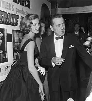 Prints of 1955: Married American actors Humphrey Bogart (1899 - 1957) and Lauren Bacall attend the premiere of director William Wyler's film, The Desperate Hours in which Bogart starred The Essence of Cool: Bogie And Bacall