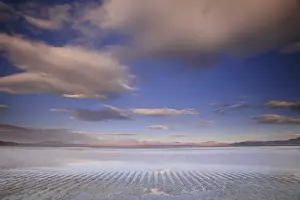 Salt Flat Prints: Bolivia, Salar de Uyuni, clouds reflecting in water